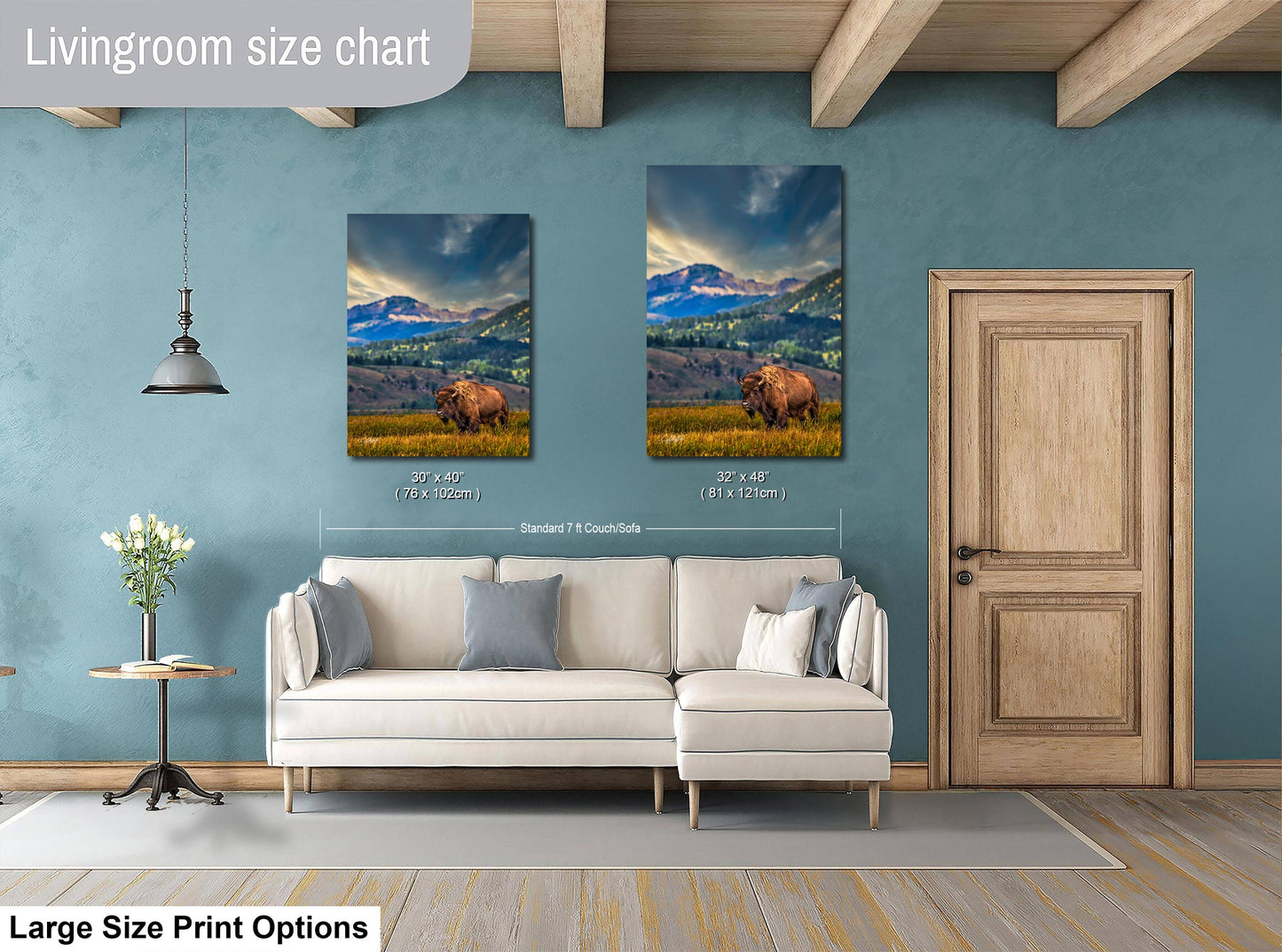 a living room with a couch and two pictures on the wall