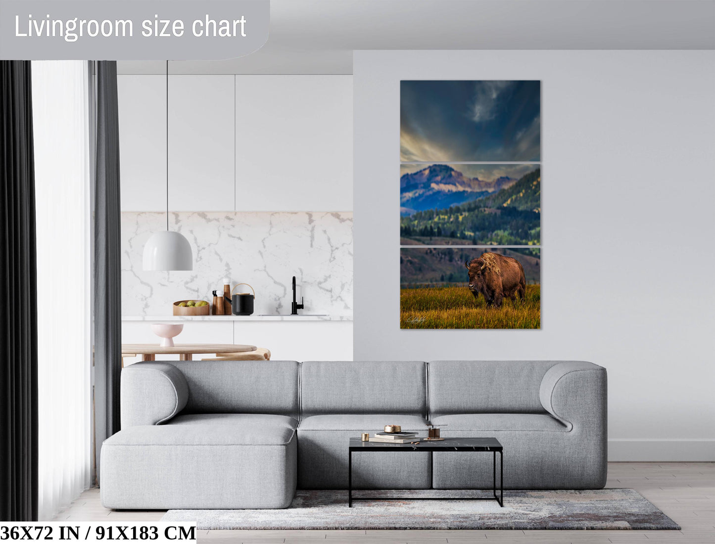 a living room with a couch and a painting on the wall
